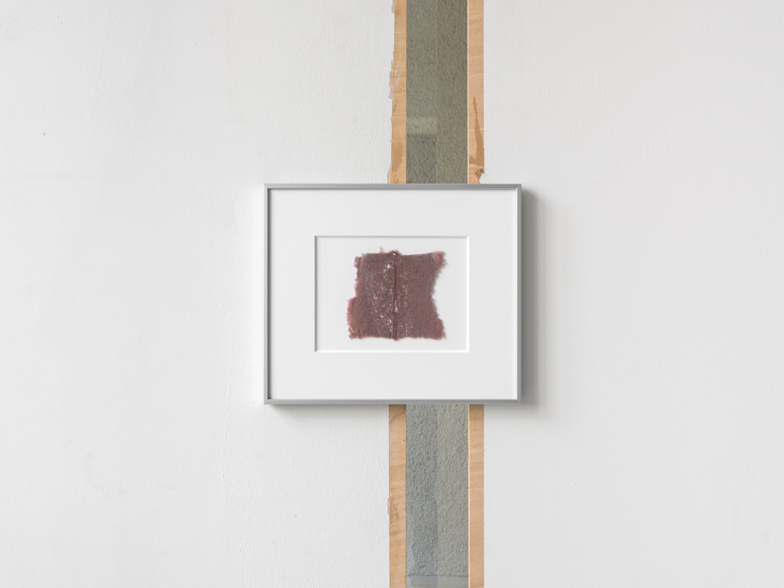 Aisha Altenhofen solo exhibition at Austin Space: Installation view of four small photographic works of a wood workshop.